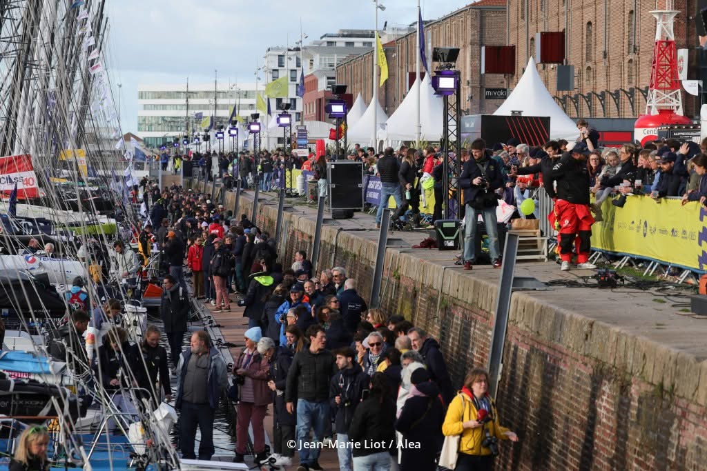 Race village crowd and international event atmosphere